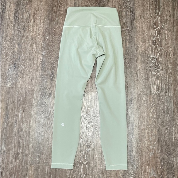 Like New Lululemon Wunder Train High-Rise Tight 25". Color Laurel Green. Size 6 - Picture 3 of 6
